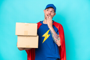 Super Hero delivery man over isolated background looking up while smiling