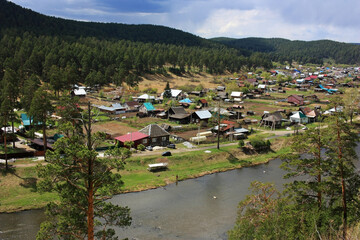 Peasant Tatar village on the banks of the river