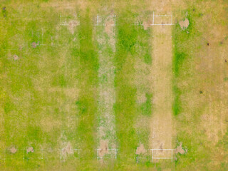 Aerial view of Crompark Cricket Club. A worn out cricket green during summer drought in August 2022.