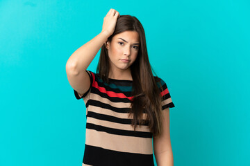 Teenager Brazilian girl over isolated blue background with an expression of frustration and not understanding
