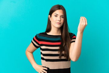Teenager Brazilian girl over isolated blue background making Italian gesture