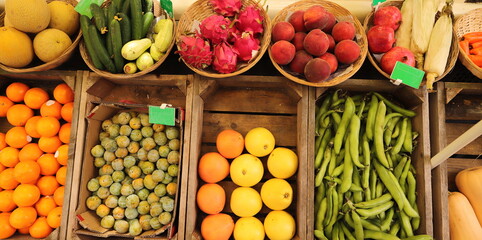 a market stall with different vegetables