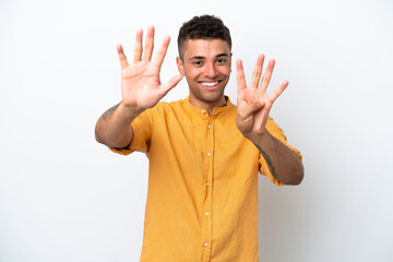 Young caucasian Brazilian man isolated on white background counting nine with fingers