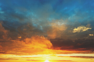 Naklejka na ściany i meble Dramatic colorful cloudy sky at sunset