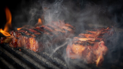 Isolated close up of delicious pork spare ribs roasted on the grill