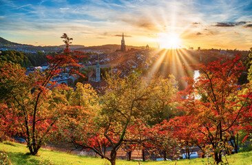 Amazing autumn scenery of old town of Bern at sunset. View from Rosengarten hill, Bern, Switzerland. UNESCO World Heritage Site