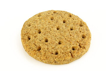 One dry tea cookie with holes isolated on white background