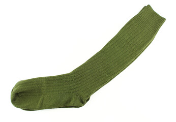 Long green winter socks isolated on white background