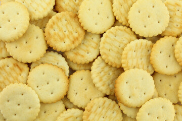Full background texture of salty round crackers