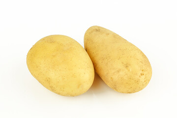 Two raw organic potatoes isolated on white background