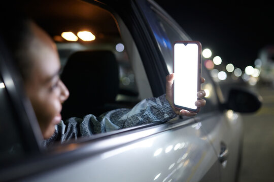 Woman Using Smartphone In Car