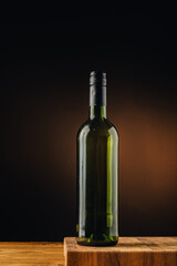 Fototapeta na wymiar bottle of wine on dark background.