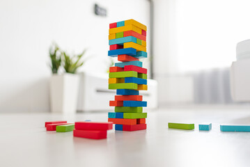 wood game tower with colorful brick.