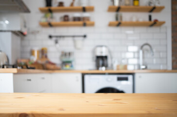 empty wooden tabletop and blurred kitchen mock up for product display