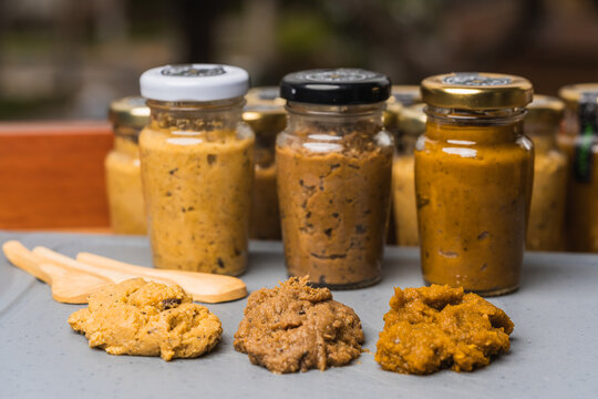 Many jars with vegetable sauce