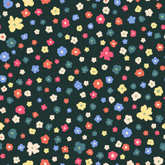 Cute, little calico flowers seamless repeat pattern. Random placed, vector floral all over surface print on dark green background.