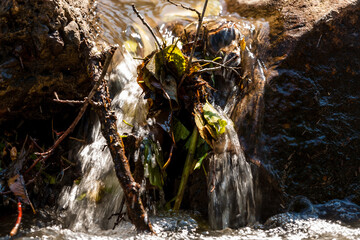 tiny river waterfall