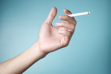hand holding cigarette