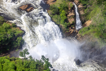 Naklejka na ściany i meble Aerial view of Murchison Falls, a waterfall between Lake Kyoga and Lake Albert on the Victoria Nile in Uganda. Also known as Kabalega or Kabarega Falls
