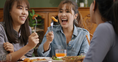 Asia people success young teen girl female group taste tasty buffet dining sit talk or share in...