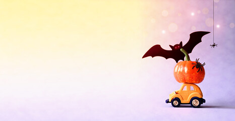 Toy car with funny pumpkin on the roof and bats on purple background. Space for text. Halloween...
