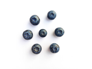 Blueberry scatter on white isolated background.