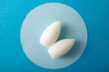 Medicinal bullet shape tablets for vaginal use. Moisturizing treatment. - obrazy, fototapety, plakaty