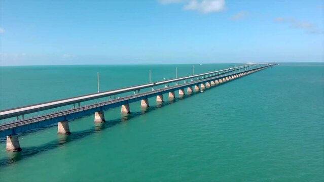Wide slow moving left aerial drone shot of 7 Mile Bridge in Florida Keys