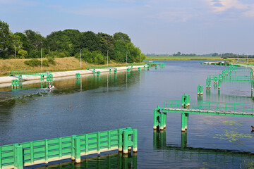 The canal of the historic sluice in Przegalina for ships sailing at different water levels between...