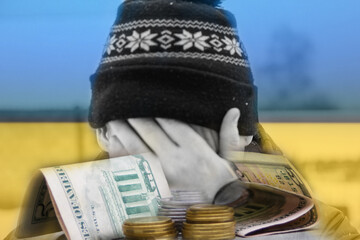 Defocus man hiding face. Increase in the cost of gas bill. Ukraine flag. Energy industry. Finance...