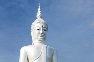 Giant Buddha in the Temple Wat Phu Manorom, Mukdahan province, Thailand. - obrazy, fototapety, plakaty