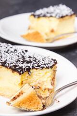 Fresh baked cheesecake on white plate. Delicious dessert