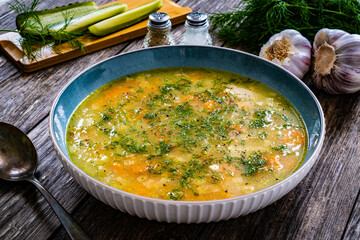 Cucumber soup on wooden table
