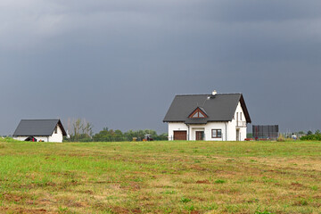 Fototapeta na wymiar Typical country houses in northern Poland. Contemporary architecture