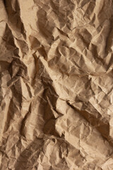 Crumpled parcel paper background texture. Recycling concept and brown paper