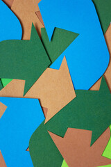 Сardboard paper arrows as abstract background texture