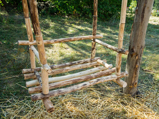 Swings made from wooden poles