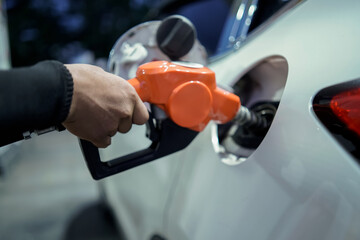 gas station, Worker hand with gas station gun