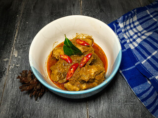 delicious chicken rendang with traditional spices that create a mesmerizing taste.