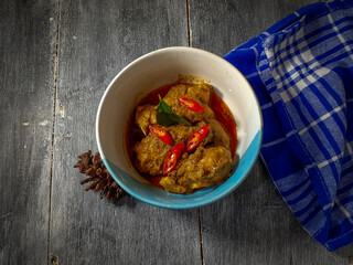 delicious chicken rendang with traditional spices that create a mesmerizing taste 
