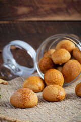 Butter cookies on wooden background. Delicious honey gingerbread