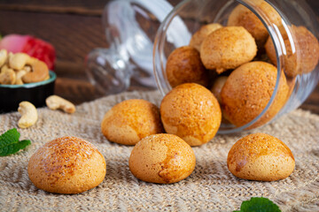 Butter cookies on wooden background. Delicious honey gingerbread