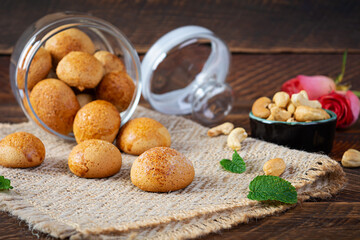 Butter cookies on wooden background. Delicious honey gingerbread
