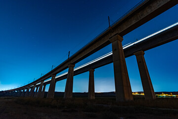 Twin train bridges at night Israel