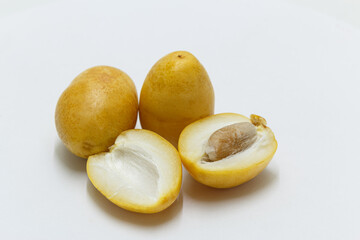 Pile of tasty sweet fresh dates isolated on white background. ,close up