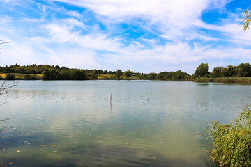 Obraz na płótnie Canvas A beautiful photo of a pond on a sunny day.