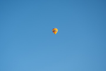 Hot air balloon flight over Cappadocia, Turkey, Goreme village, hot air balloon parade