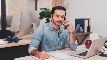 entrepreneurial executives sitting smiling. business manager lifestyle Indoor self-confidence.professional male technical young white computer company work laptop