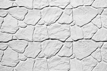 The light white stone wall texture. Background.