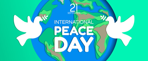 international peace day banner design with earth planet and doves paper cut style  vector illustration
